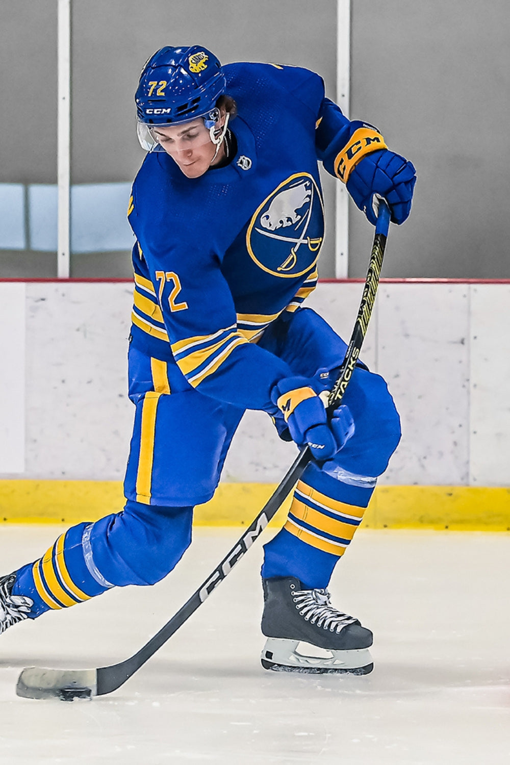 Tage Thompson taking a wrist shot with the CCM AS-VI hockey Stick